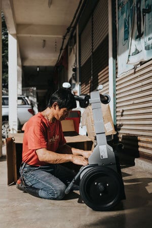an engineer repairing a cleaning equipment