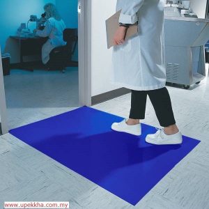 A person was walking on blue sticky mat with shoes on