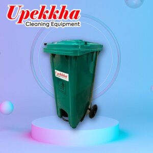 Upekkha green polyethylene wheelie bin with front foot pedal.