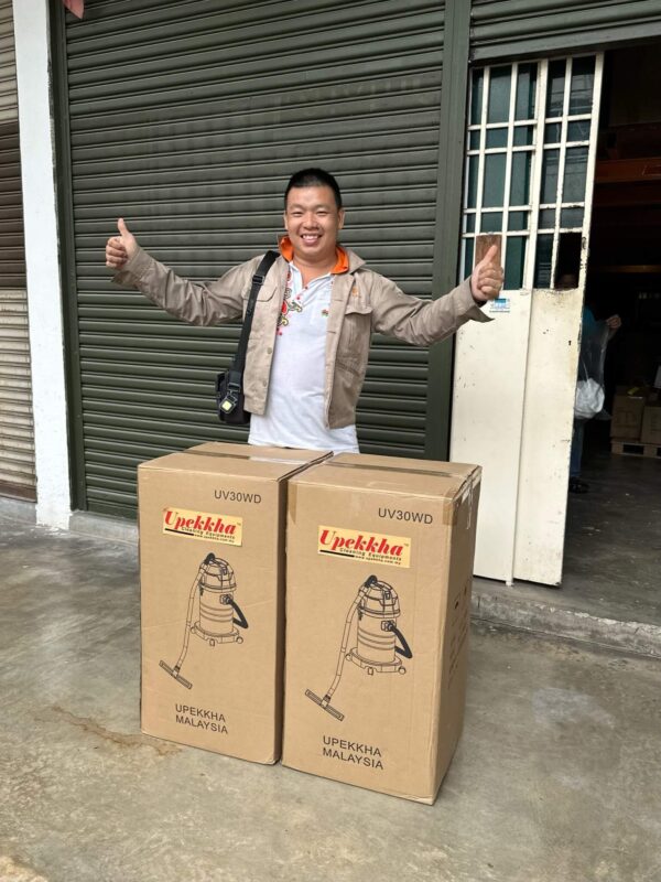 A happy customer with his two Upekkha vacuum cleaner purchase.