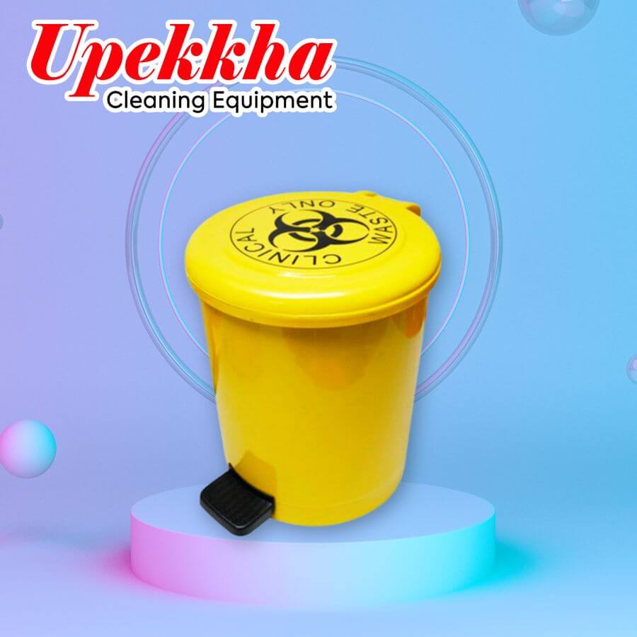 Yellow medical waste disposal bin with foot pedal for hygienic waste management.