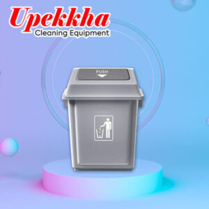 Grey polyethylene garbage bin with flip top lid for indoor use