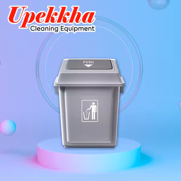 Grey polyethylene garbage bin with flip top lid for indoor use