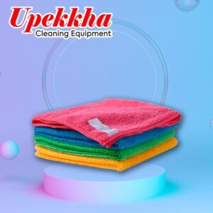 Upekkha microfiber cleaning cloth with colors pink, blue, green and yellow from the top, stacked above each other.